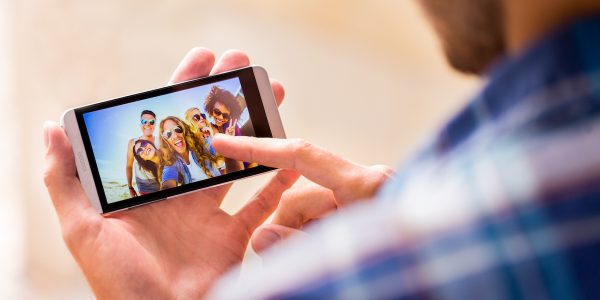 A vacation or a top-of-the-line TV: Which new purchase is more likely to elicit envy in other consumers?